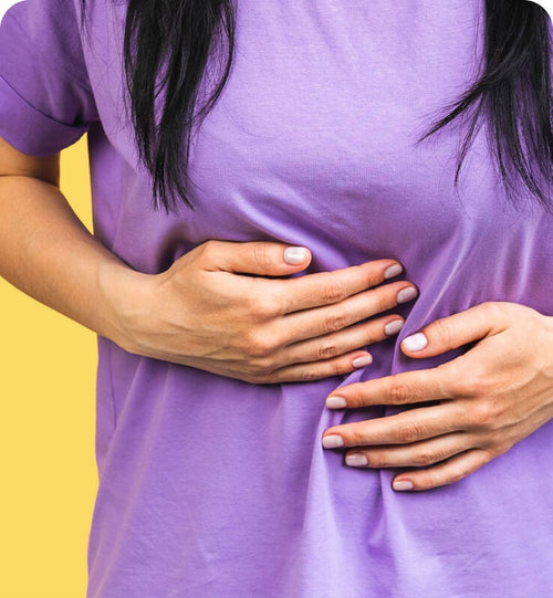 woman holding her stomach